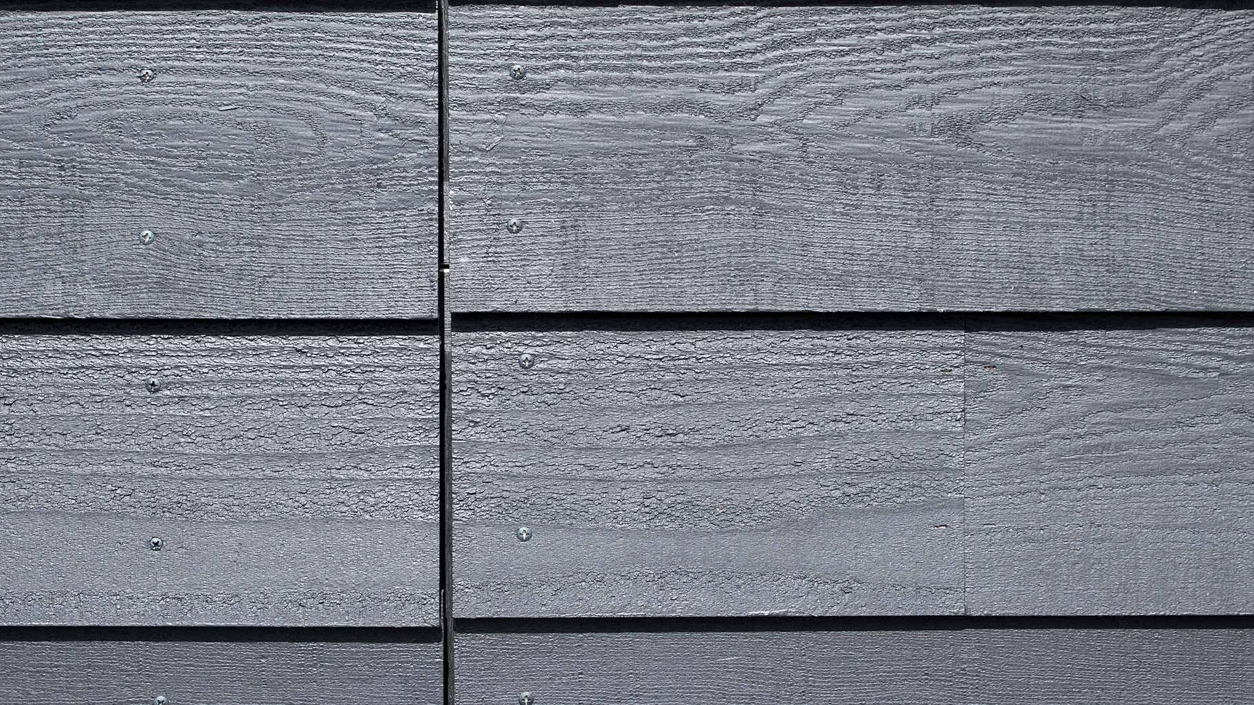 Gepotdekselde houten garagedeur rabat - Different Doors