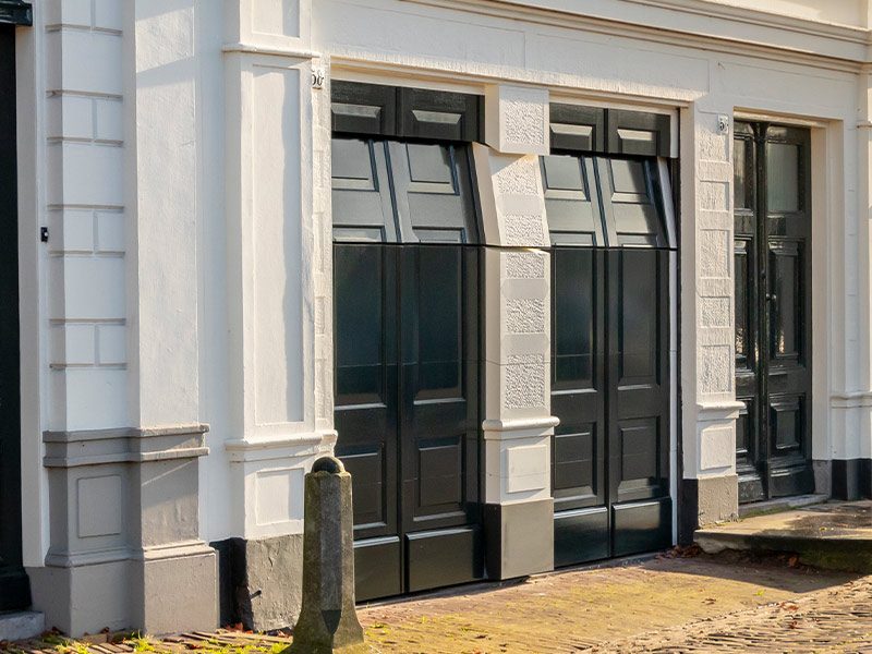 5 prachtige houten garagedeuren bij monumentale woningen